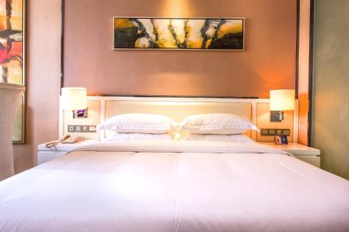 Imagen de la habitación del Hotel Rui Xin International. Foto 6