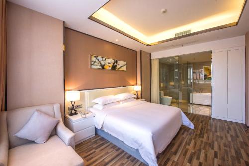 Imagen de la habitación del Hotel Rui Xin International. Foto 8