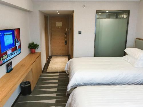 Imagen de la habitación del Hotel Ruicheng. Foto 3