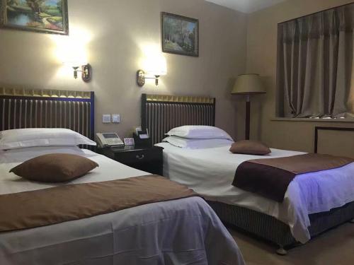 Imagen de la habitación del Hotel Ruicheng. Foto 6