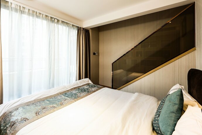 Imagen de la habitación del Hotel Ruide Apartment Poly Zhongda Branch. Foto 20