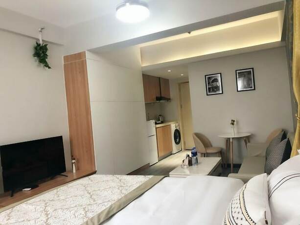 Imagen de la habitación del Hotel Ruide Apartment Xiaobei Railway Station. Foto 20