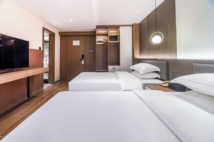 Imagen de la habitación del Hotel Ruifeng Railway Station Store. Foto 17