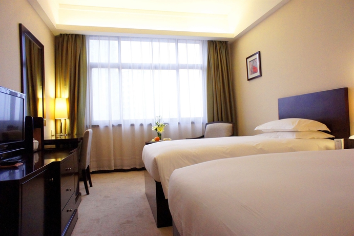 Imagen de la habitación del Hotel Ruitai Hongqiao. Foto 11