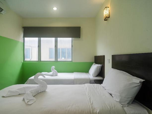 Imagen de la habitación del Hotel Rujia Inn. Foto 5
