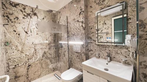 Imagen de la habitación del Hotel Ruko Boutique. Foto 18