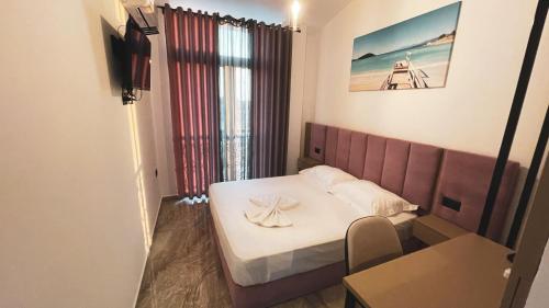 Imagen de la habitación del Hotel Ruko Boutique. Foto 19