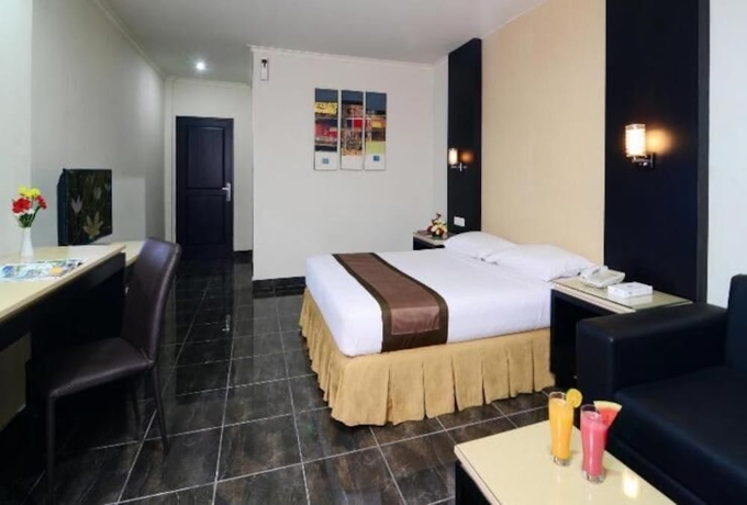 Imagen de la habitación del Hotel Rumabatavi The Tavia. Foto 6