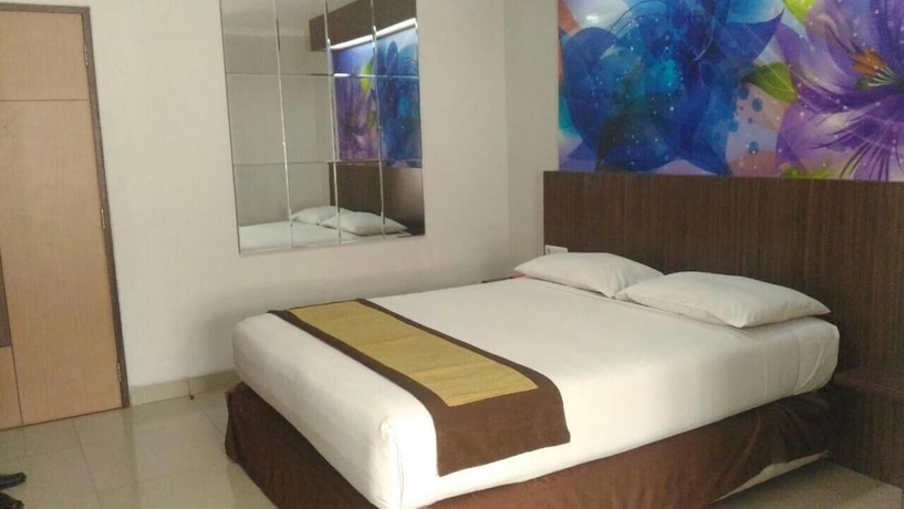Imagen de la habitación del Hotel Rumabatavi The Tavia. Foto 9