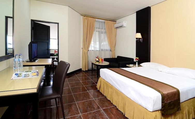 Imagen de la habitación del Hotel Rumabatavi The Tavia. Foto 12