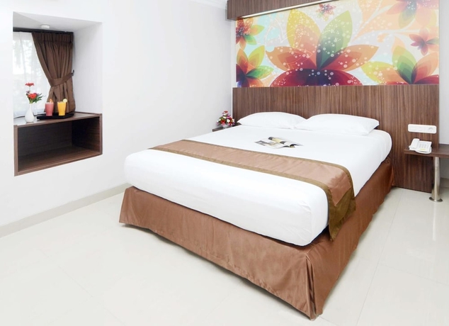 Imagen de la habitación del Hotel Rumabatavi The Tavia. Foto 13