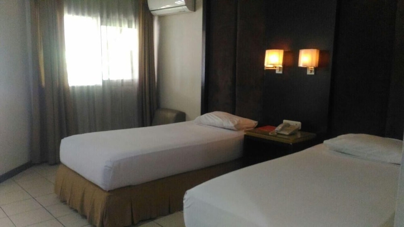 Imagen de la habitación del Hotel Rumabatavi The Tavia. Foto 15