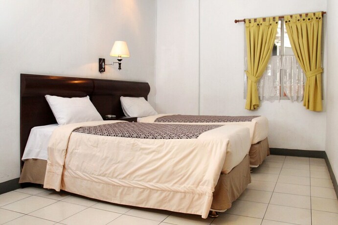Imagen de la habitación del Hotel Rumah Asri Bed and Breakfast. Foto 19