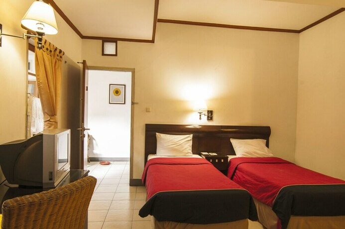 Imagen de la habitación del Hotel Rumah Asri Bed and Breakfast. Foto 23