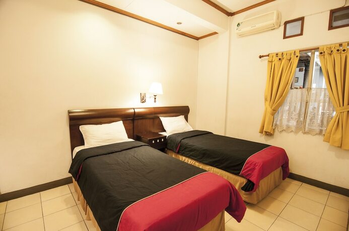 Imagen de la habitación del Hotel Rumah Asri Bed and Breakfast. Foto 27