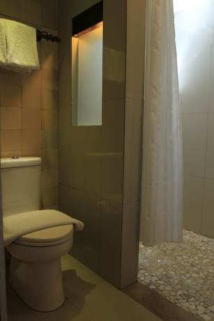 Imagen de la habitación del Hotel Rumah Batu Boutique. Foto 16