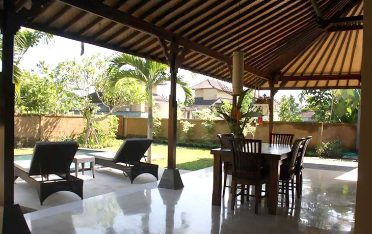 Imagen de la habitación del Hotel Rumah Dadong. Foto 2