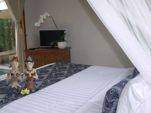 Imagen de la habitación del Hotel Rumah Dadong. Foto 3