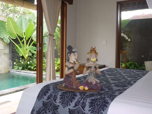 Imagen de la habitación del Hotel Rumah Dadong. Foto 5