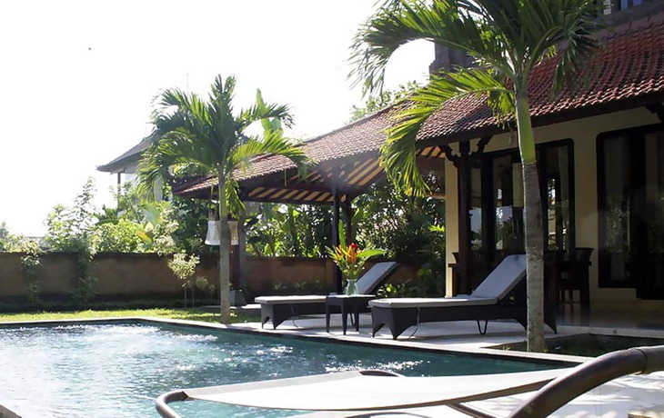 Imagen de la habitación del Hotel Rumah Dadong. Foto 8