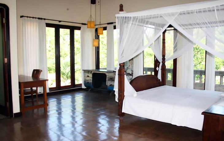 Imagen de la habitación del Hotel Rumah Dadong. Foto 9