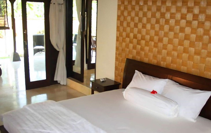 Imagen de la habitación del Hotel Rumah Dadong. Foto 10
