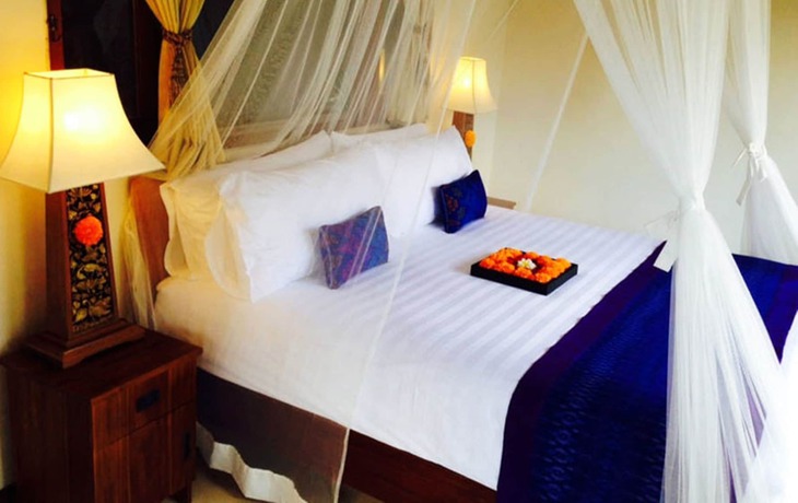 Imagen de la habitación del Hotel Rumah Dadong. Foto 11