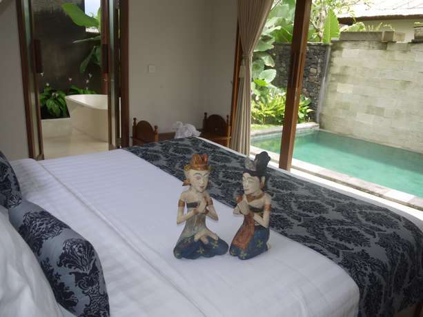 Imagen de la habitación del Hotel Rumah Dadong. Foto 13