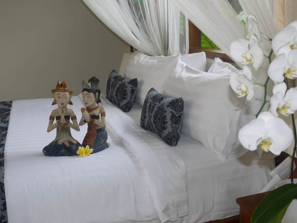Imagen de la habitación del Hotel Rumah Dadong. Foto 14