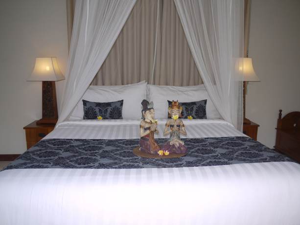 Imagen de la habitación del Hotel Rumah Dadong. Foto 15
