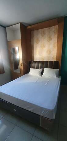 Imagen de la habitación del Hotel Rumah Dempo Syariah. Foto 5