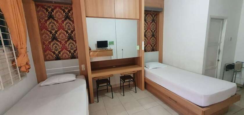 Imagen de la habitación del Hotel Rumah Dempo Syariah. Foto 7