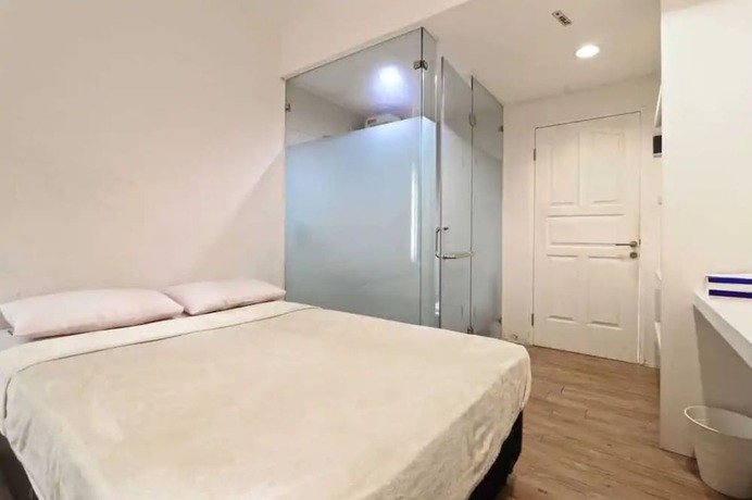 Imagen de la habitación del Hotel Rumah Kayu Manis Bintaro. Foto 11