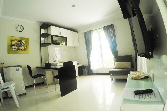 Imagen de la habitación del Hotel Rumah Kecil Jatirejo. Foto 14