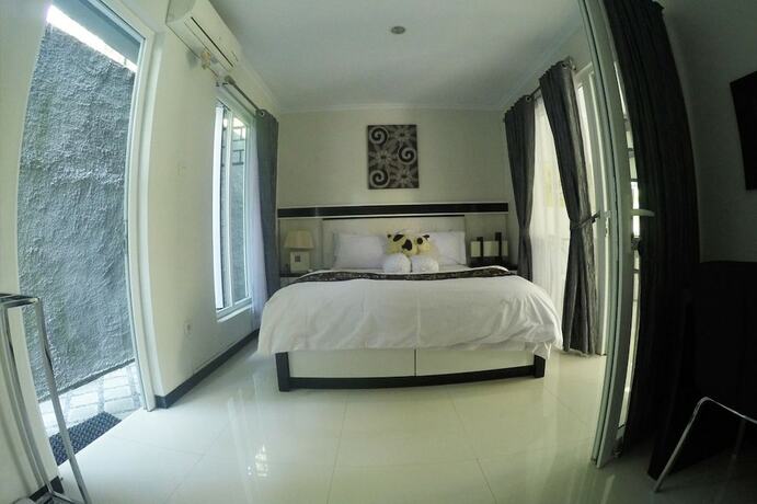 Imagen de la habitación del Hotel Rumah Kecil Jatirejo. Foto 17