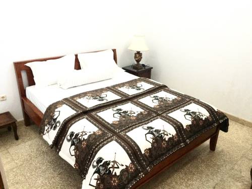 Imagen de la habitación del Hotel Rumah Panjaitan. Foto 1
