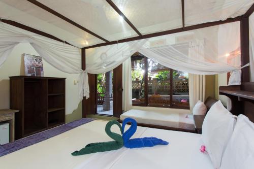 Imagen de la habitación del Hotel Rumah Roda. Foto 5