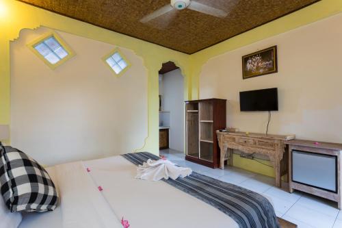 Imagen de la habitación del Hotel Rumah Roda. Foto 7