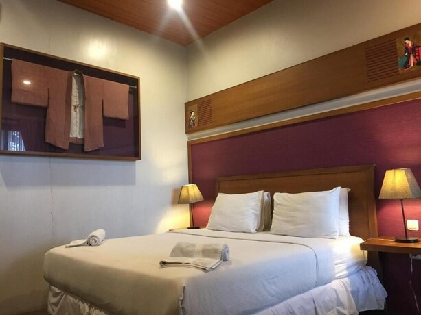 Imagen de la habitación del Hotel Rumah Stroberi Organic Farm and Lodge. Foto 31