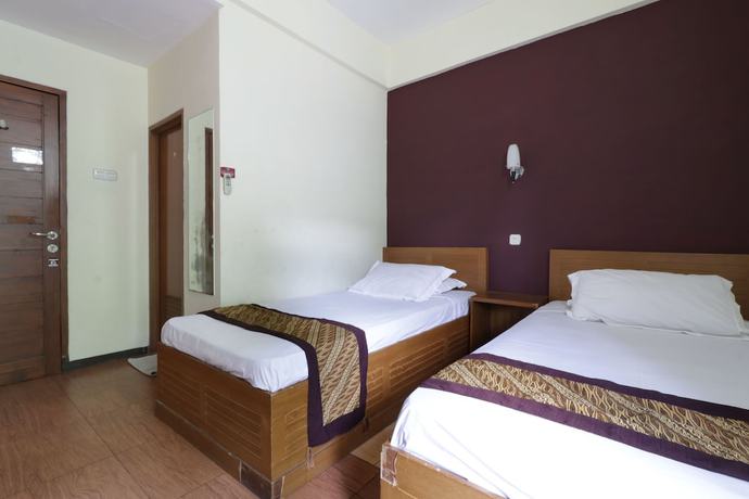 Imagen de la habitación del Hotel Rumah Tawa. Foto 7