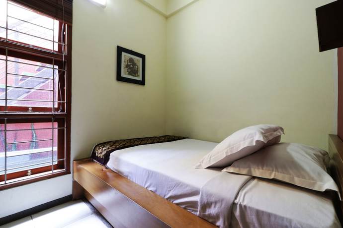 Imagen de la habitación del Hotel Rumah Tawa. Foto 8