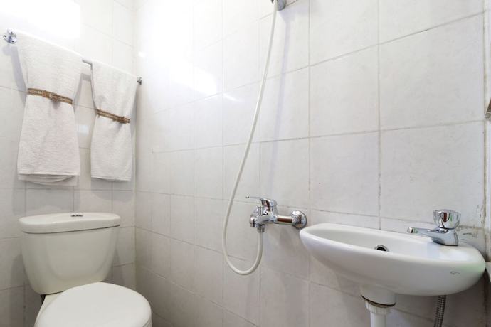 Imagen de la habitación del Hotel Rumah Tawa. Foto 11