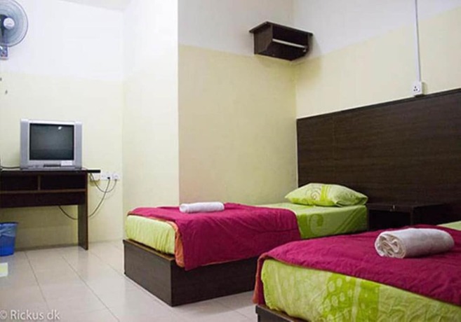 Imagen de la habitación del Hotel Rumah Tumpangan Abby. Foto 8