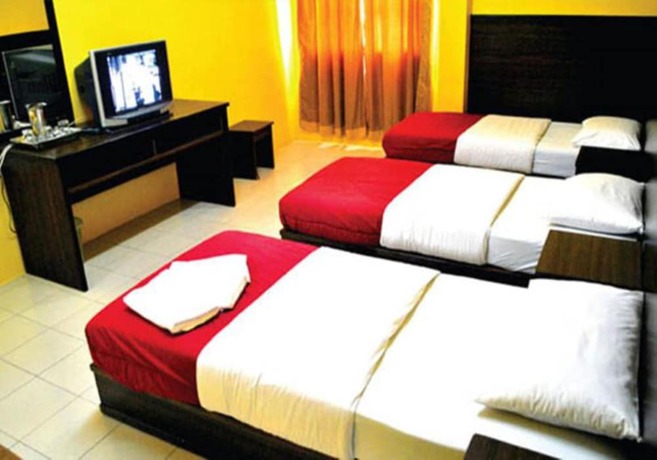 Imagen de la habitación del Hotel Rumah Tumpangan Abby. Foto 10