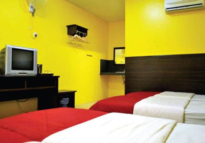 Imagen de la habitación del Hotel Rumah Tumpangan Abby. Foto 11