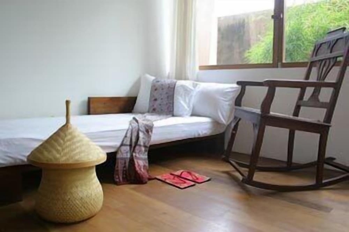 Imagen de la habitación del Hotel Rumah Turi Eco. Foto 9