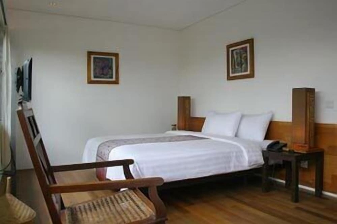 Imagen de la habitación del Hotel Rumah Turi Eco. Foto 12