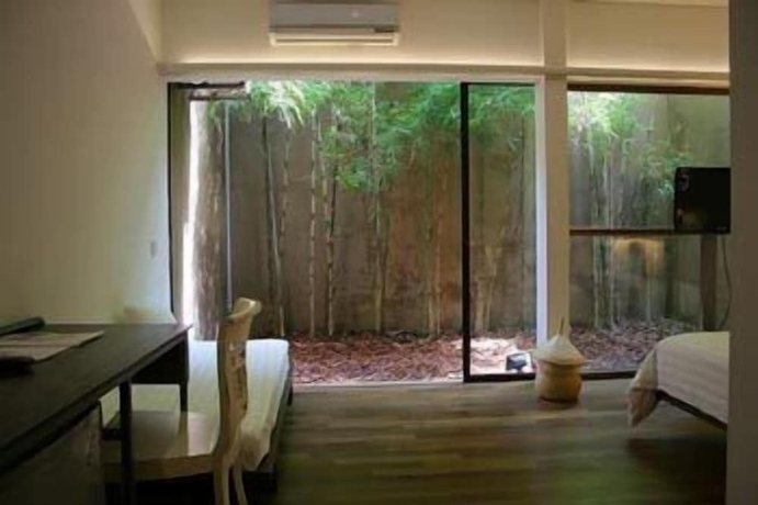 Imagen de la habitación del Hotel Rumah Turi Eco. Foto 14