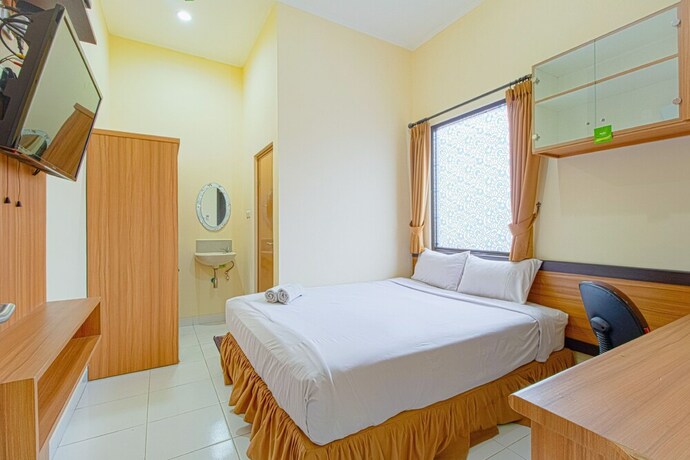 Imagen de la habitación del Hotel Rumah Verde. Foto 6