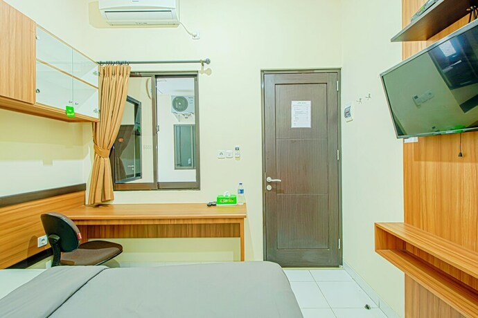 Imagen de la habitación del Hotel Rumah Verde. Foto 7
